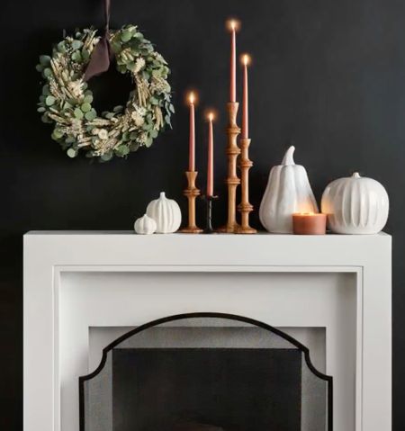 Fall home decor ideas for the fireplace mantle - wood tapered candle holders, faux wreath, pumpkin decor, candles 

Halloween and harvest thanksgiving home decor ideas, cozy home, crate and barrel finds 

#LTKhome #LTKSeasonal #LTKHoliday