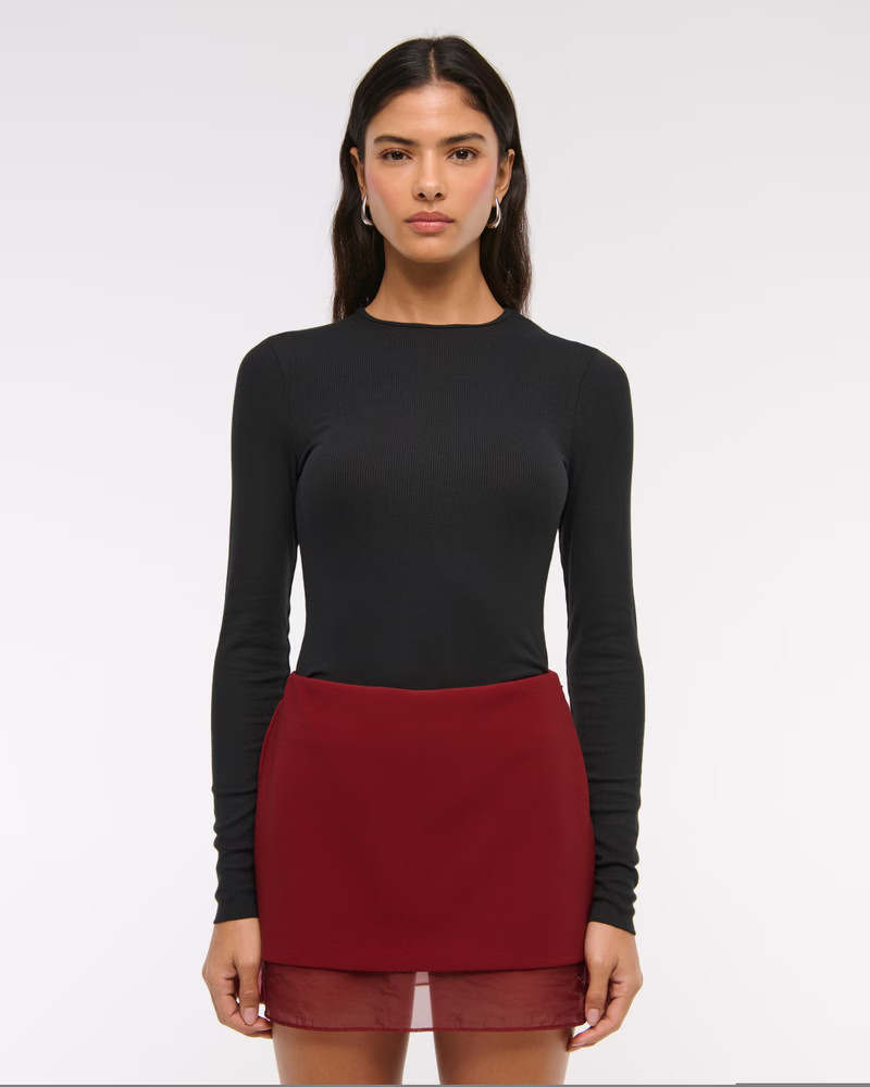 Women's Mid Rise Sheer Hem Mini Skort | Women's Bottoms | Abercrombie.com | Abercrombie & Fitch (US)