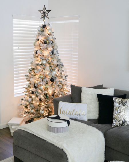Christmas home decor, flocked pre-lit Christmas tree under $100

#LTKHoliday #LTKSeasonal #LTKhome