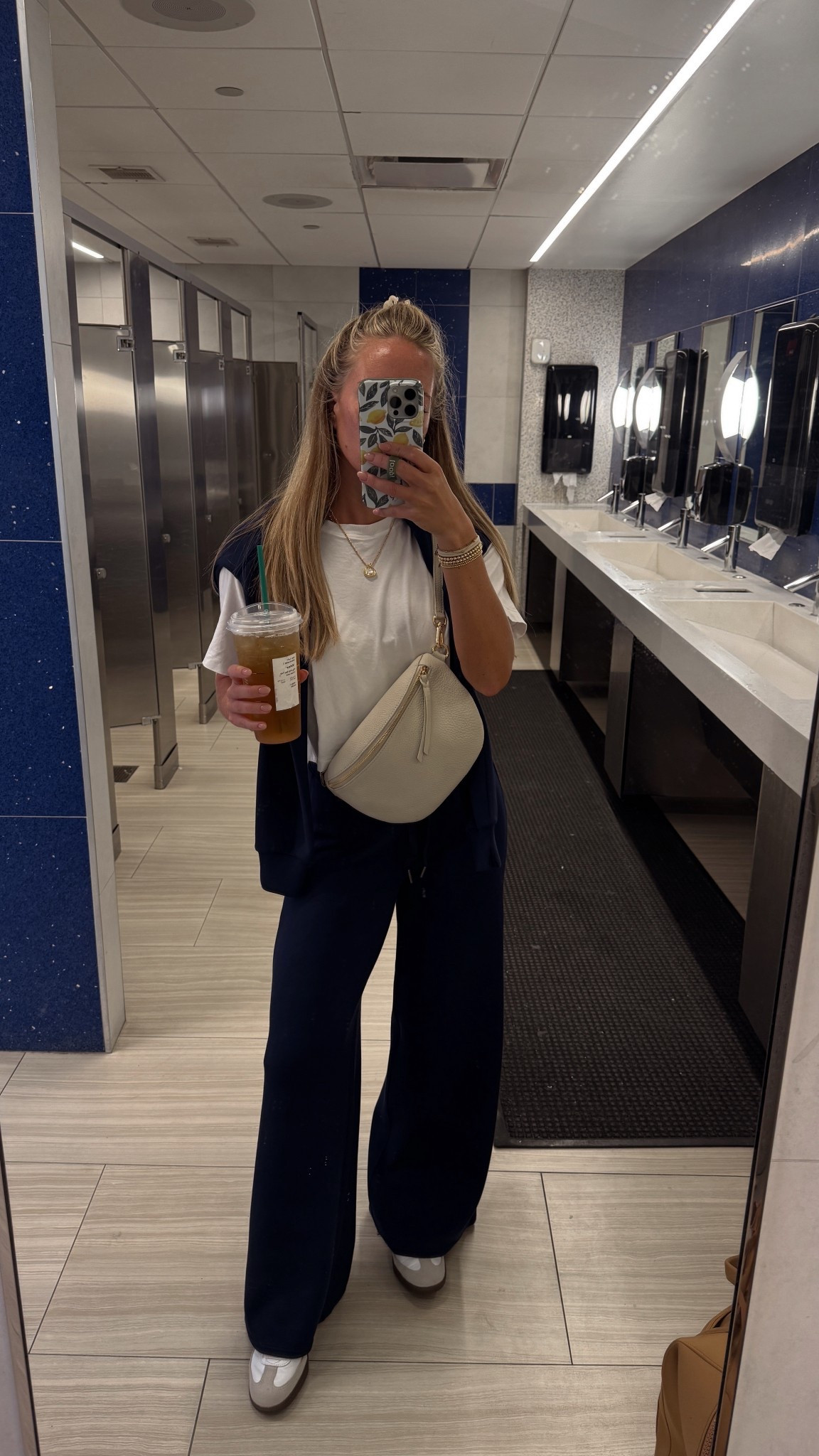 Travel outfit wearing Spanx air essentials set with organic cotton white tee! Size small in all 