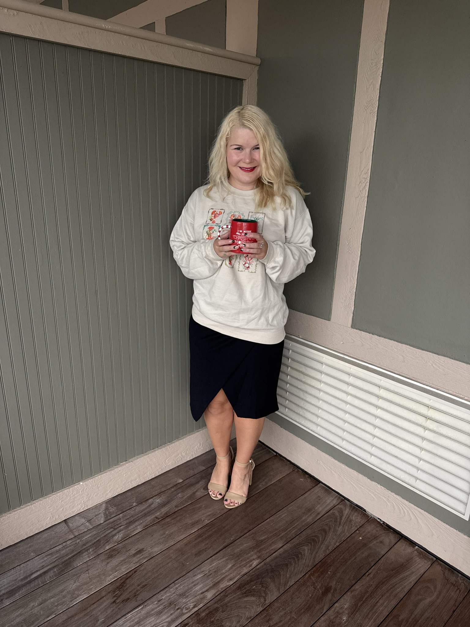 Tuesday OOTD. I am in my Christmas graphic era. I love pairing a sweatshirt with a black skirt for a festive work ootd. 

#LTKHoliday #LTKPetite #LTKootd