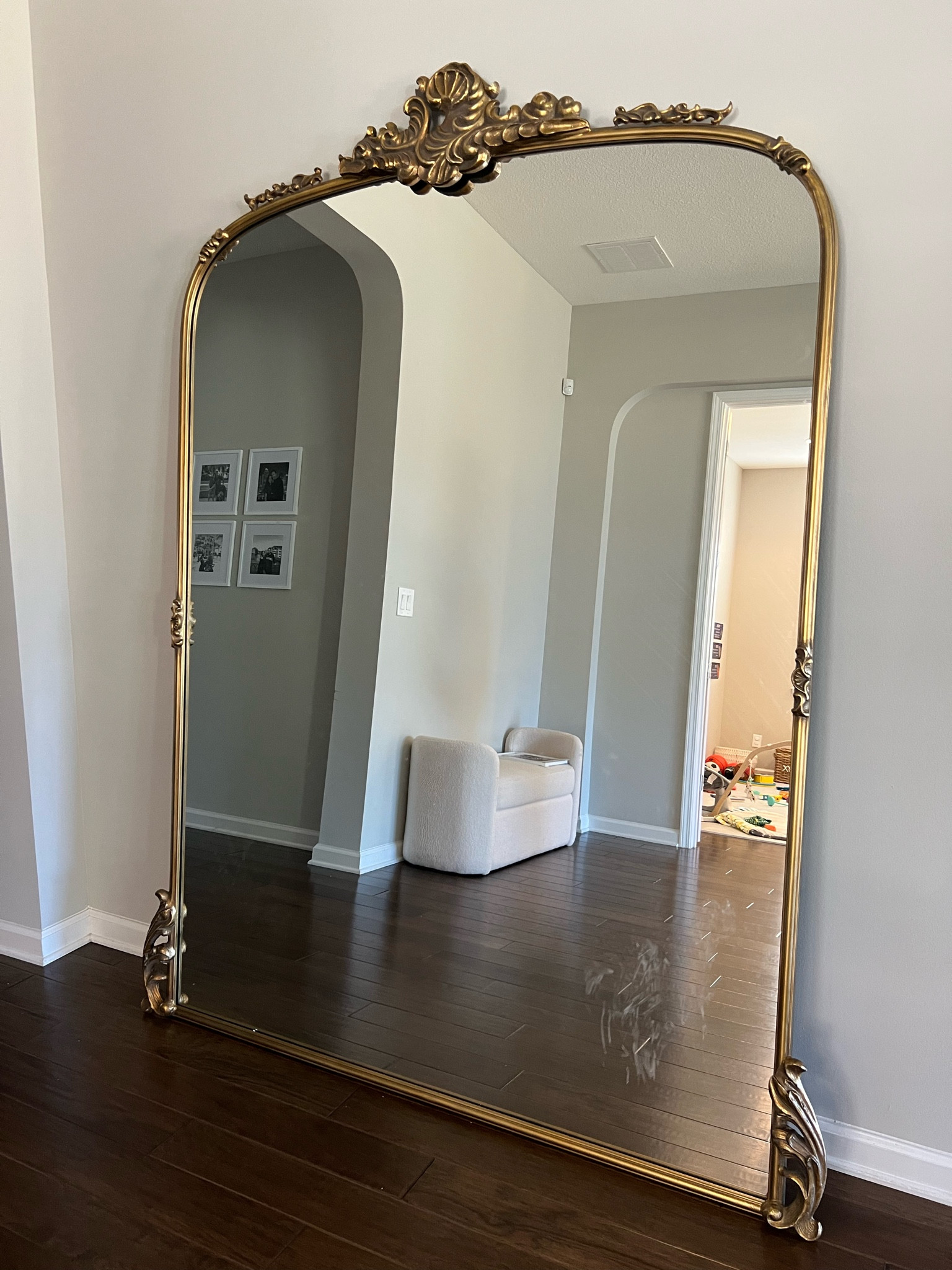 Excuse the baby hands on the lower corner, but this beautiful mirror just arrived and I wanted to show it to you guys because it is my dream fancy wide, super tall gold, Amelie mirror :)

#LTKhome #LTKGiftGuide