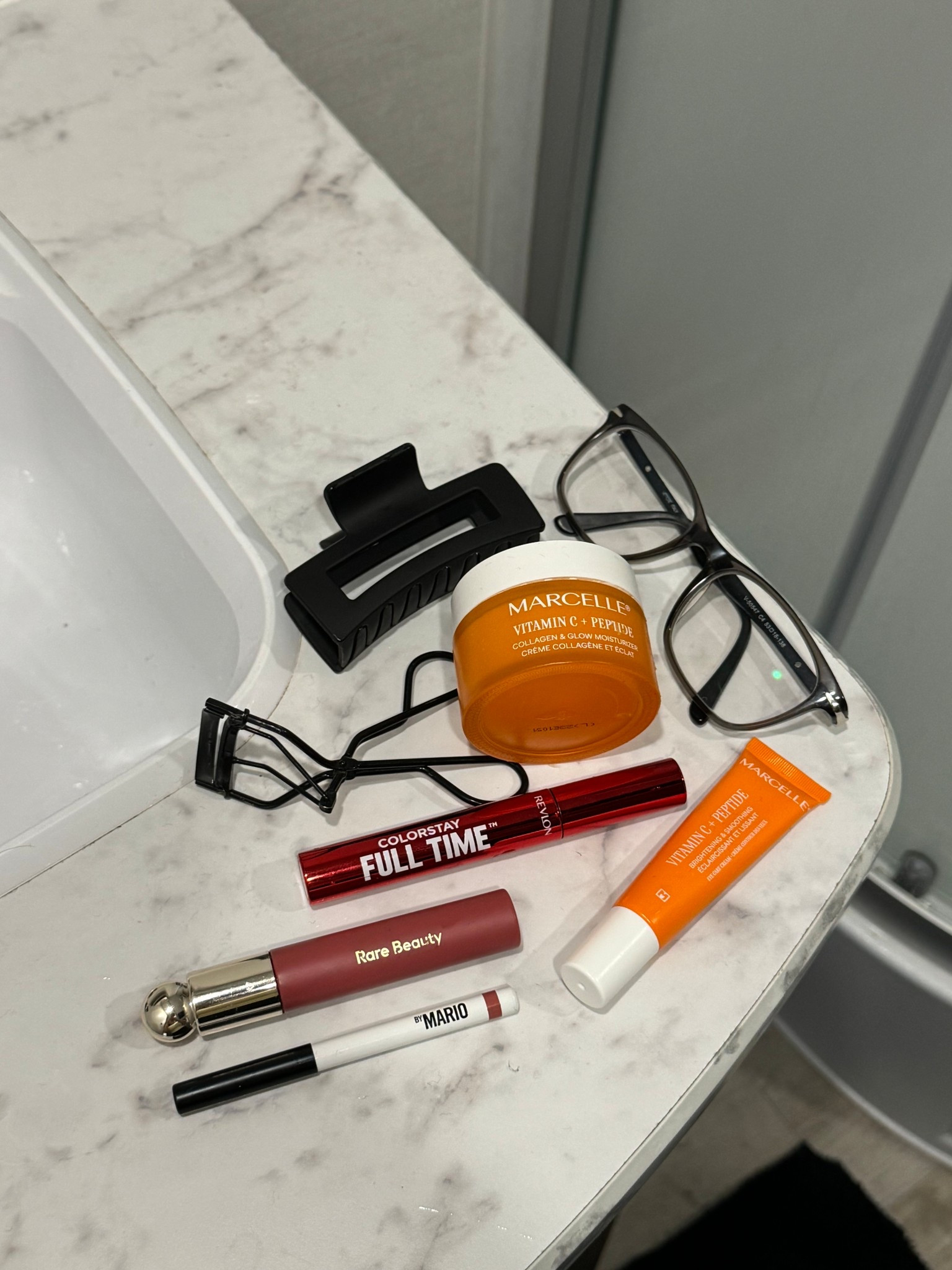 The usual line up: skincare, makeup, claw clip, and of course glasses (because I literally can't see without them haha 🤓

#LTKbag #LTKdatenight #LTKsale
