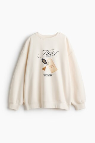 H & M - Oversized Printed Sweatshirt - Cream/Condé Nast Traveler | H&M (US + CA)