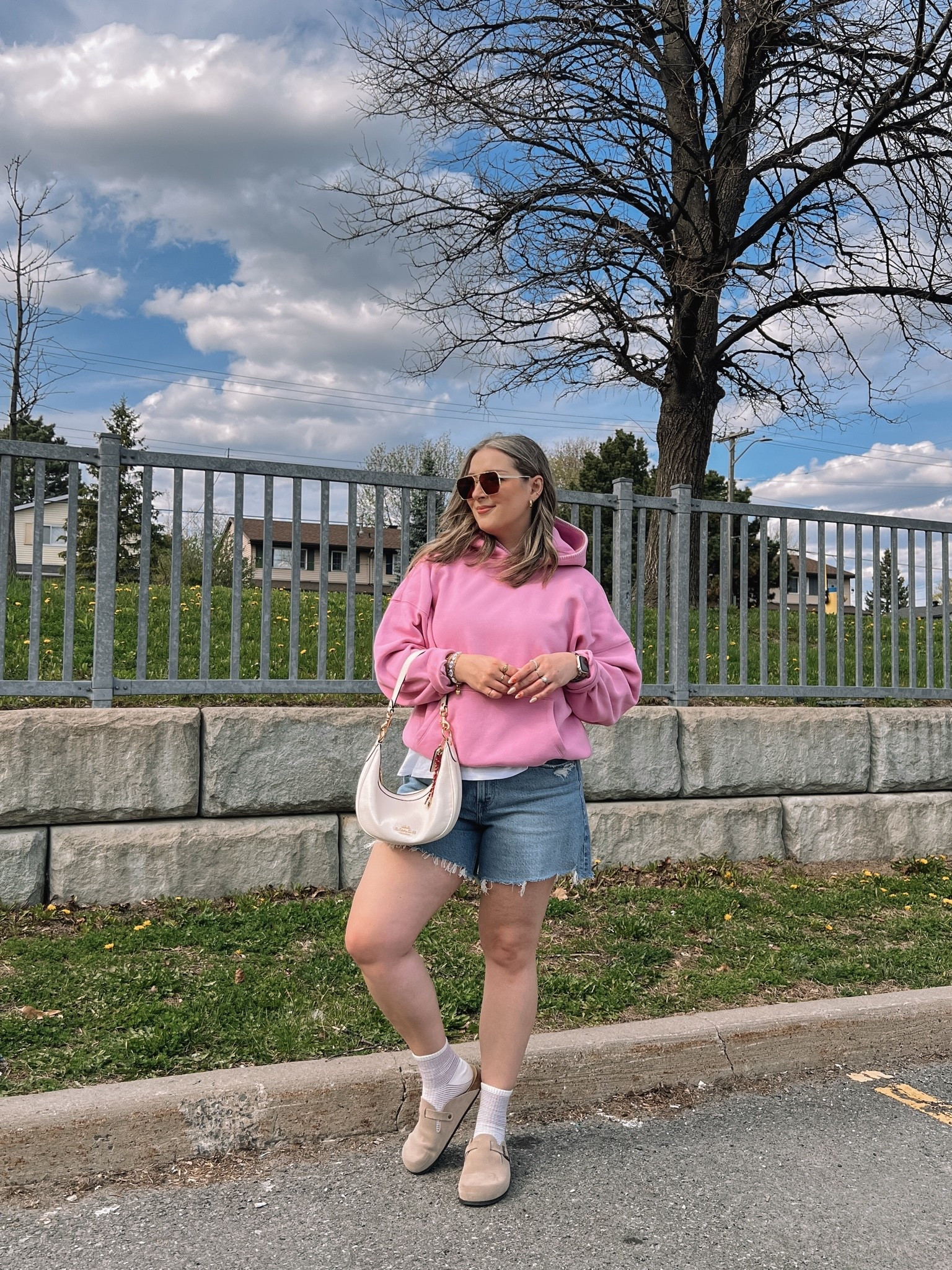 Comfy casual spring outfit! Wearing 32 in the shorts, I recommend sizing up! Also sized up in the pink hoodie for an oversized fit. Linked similar clogs

#LTKsummer #LTKmidsize