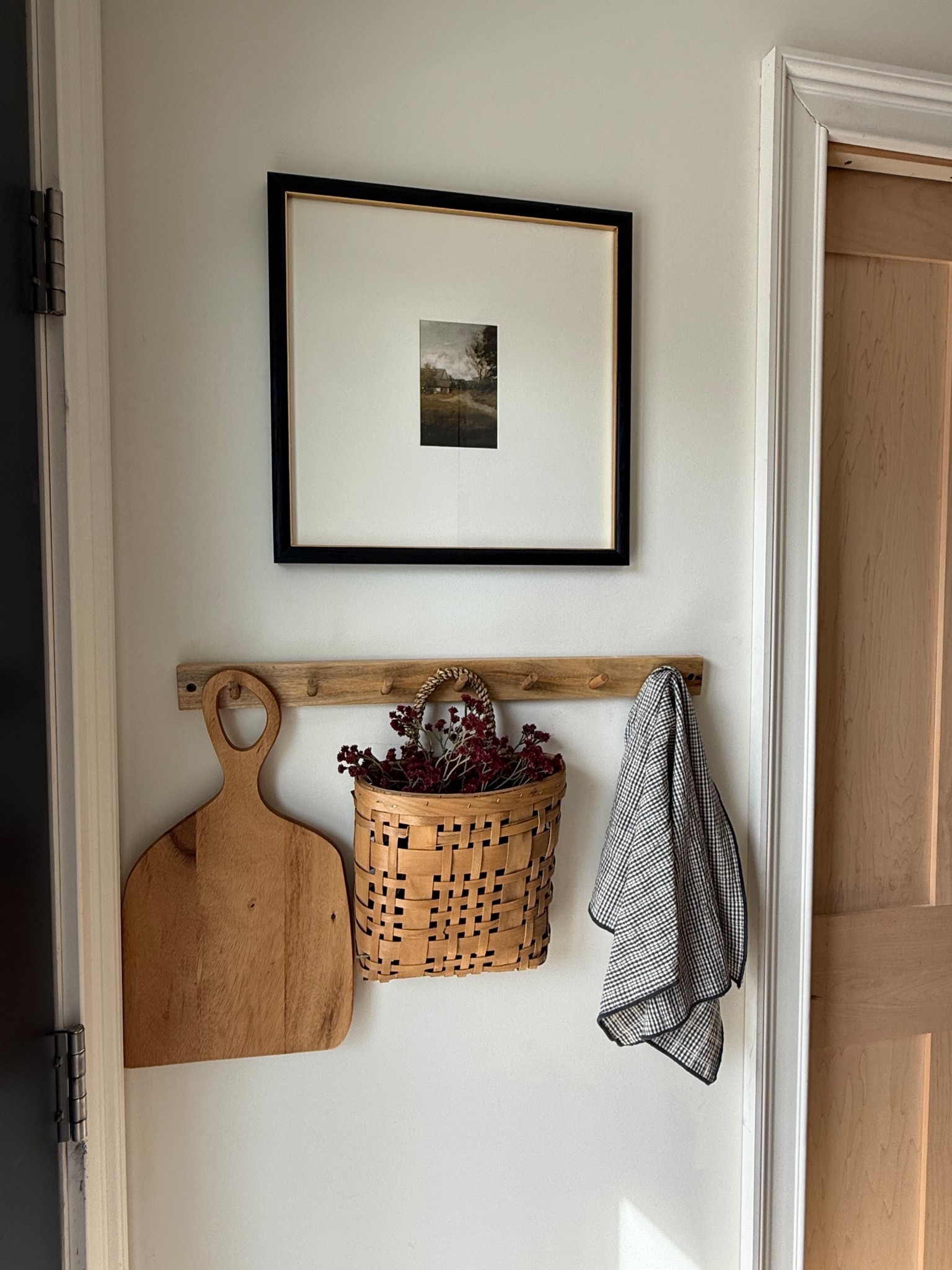 My favorite black frame with gold gold detailing is on sale. I have this one in my kitchen, but I also have two in our living room. The gold detailing is so pretty. We have had this wooden coat hanger for a while, but I linked a similar one.

#LTKHome
