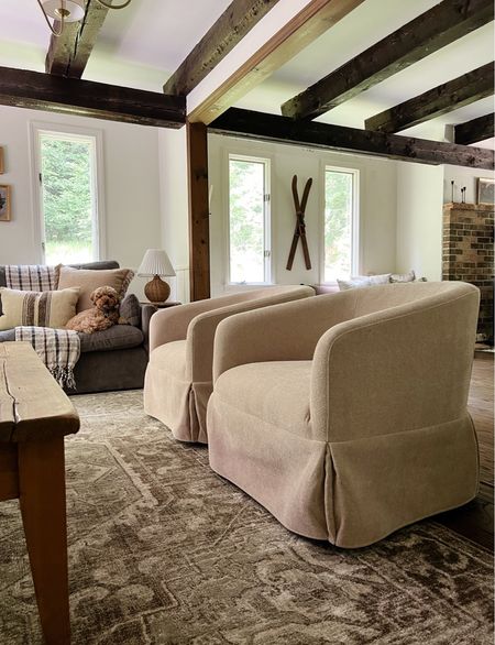 Accent chairs in our cozy living room. Not only are they cute - but they swivel! 

#LTKHome