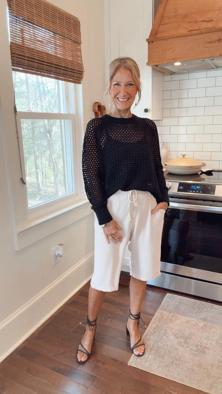 Black open knit top, lightweight breathable knit, cute Bermuda shorts, flattering mid-length, casual chic style, effortless warm-weather outfit, comfy but cute, everyday over-50 style.  Wearing a small.

#LTKSpringSale #LTKgrwm #LTKootd