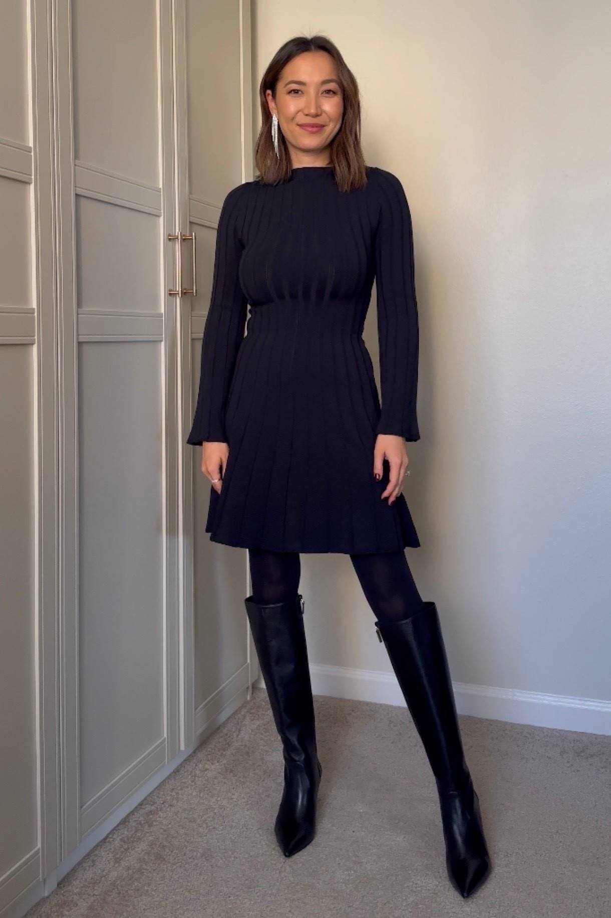 Minimal + chic holiday dress 

Sweater dress — on sale at Jcrew, linked to a similar style I found at Nordstrom! 
Tights — linked to similar style 
Stuart Weizmann boots — old, linked to similar style

#LTKHoliday #LTKootd