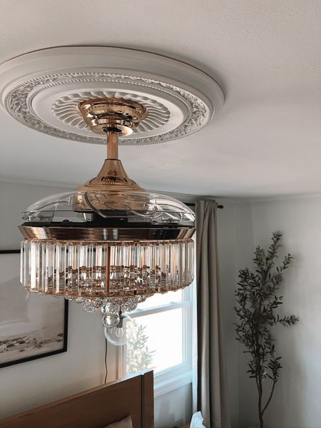 Beautiful lighting design of by
piece with ceiling medallion

#LTKhome