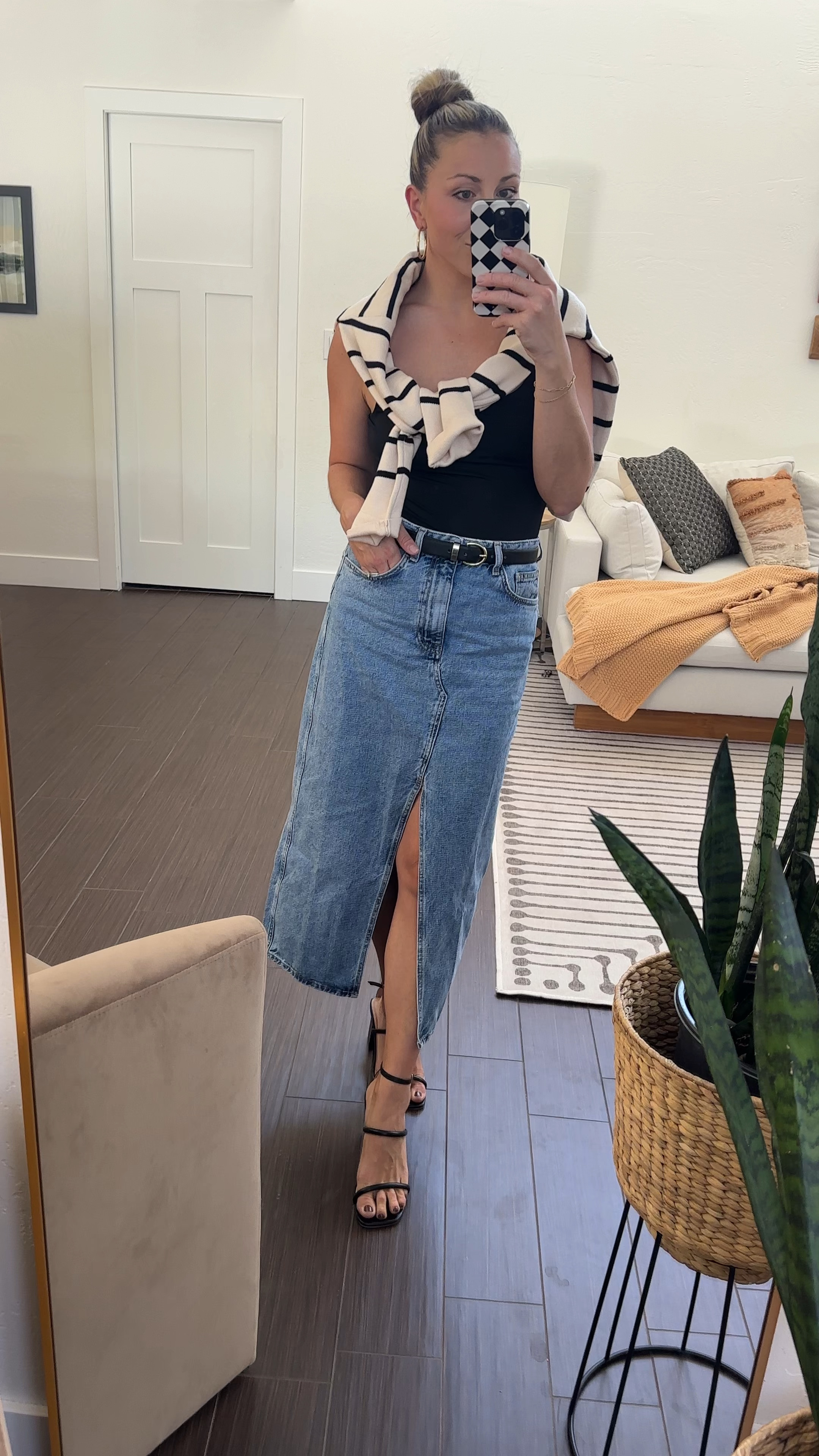 Cool mom. True to size in all items! Loving the midi denim skirt trend and sweaters draped over shoulders. A slicked bun helps too 

#LTKstyletip #LTKfindsunder100 #LTKSeasonal