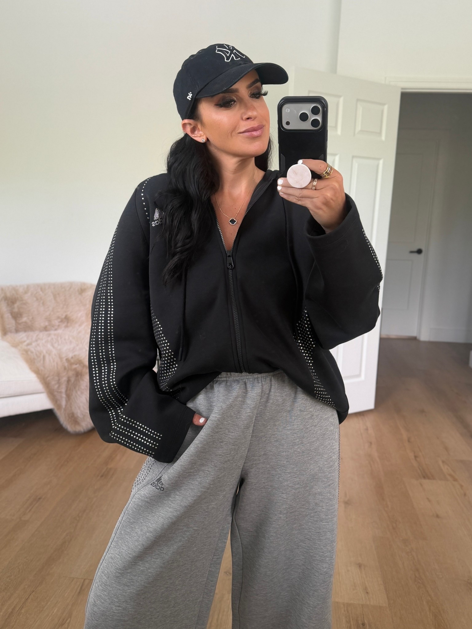 adidas Teamgeist Rhinestone Track Top - Black wearing size small. adidas TEAMGEIST RHINESTONE TRACKPANTS - Grey wearing size small. Kids og embellished samba sneakers. I googled how to convert womens to kids sizes. I wear women’s size 8.5 and wear a size 7 in kids