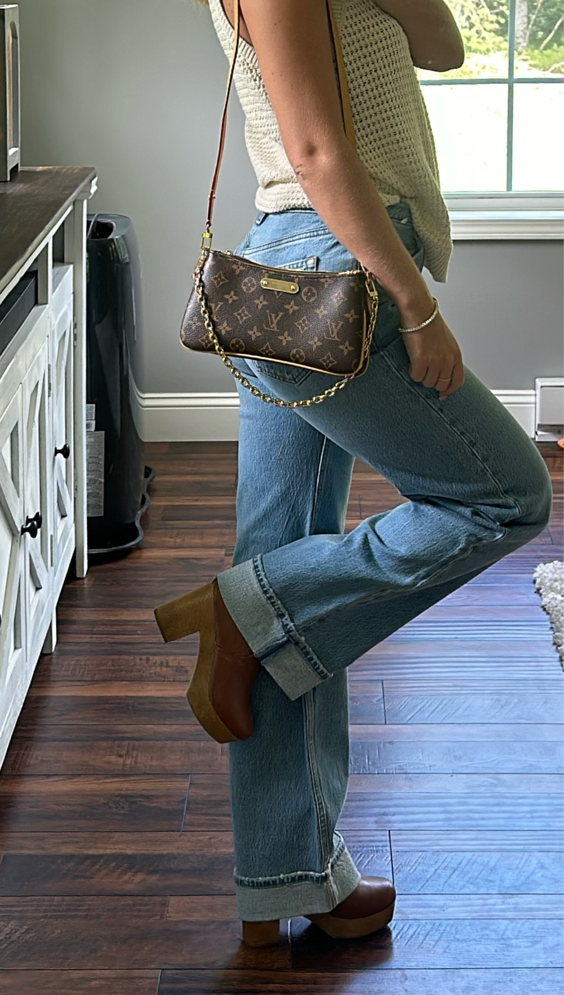 Fall transitional fit 🤎👢✨ size 26 in the jeans, the LV purse is the M83008 Liv Pochette & booties and tank are old so linking similar! 