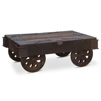Sterling 48-Inch Reclaimed Iron Wheeled Coffee Table | Wayfair North America