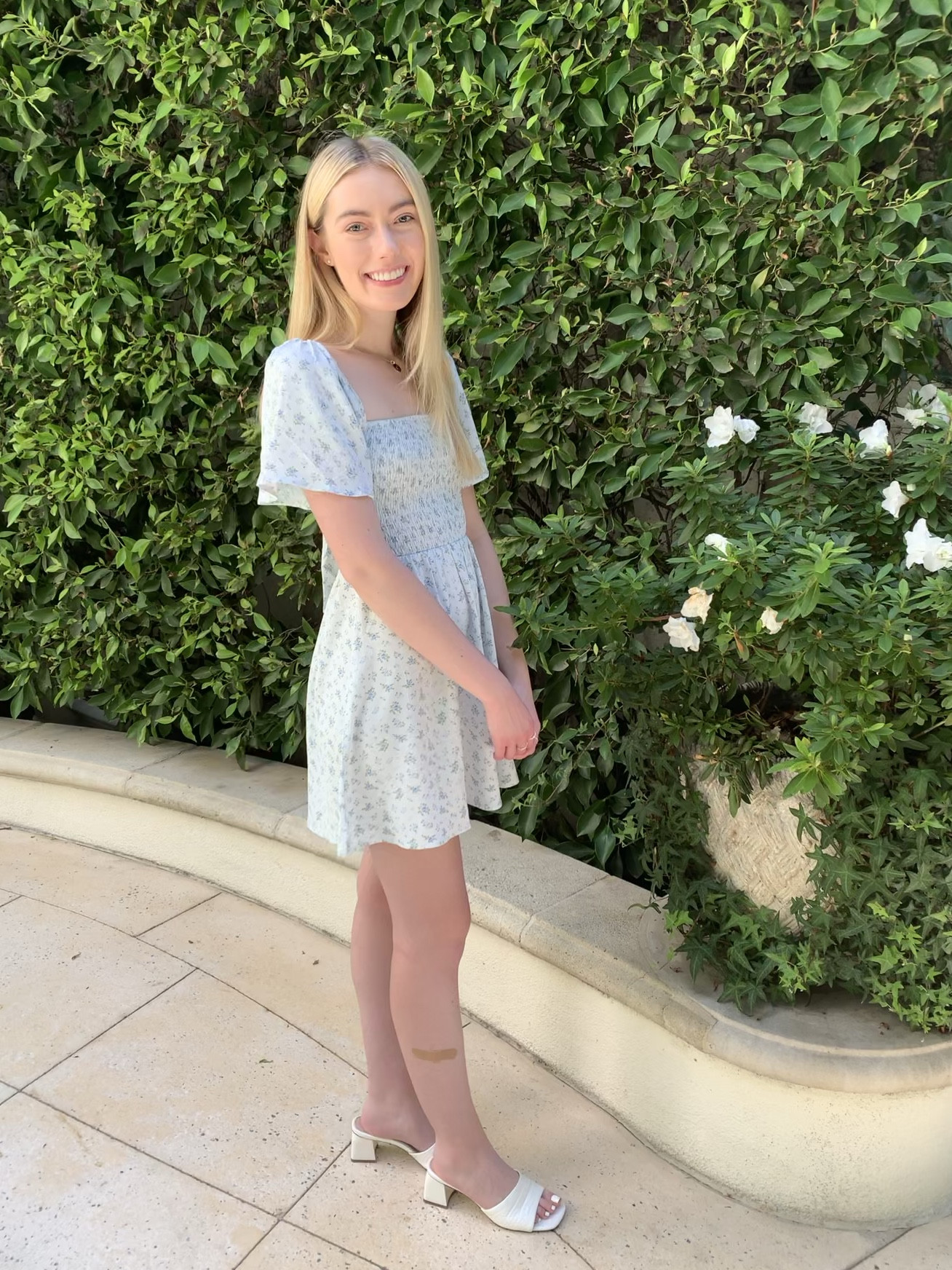 Cute spring outfit. Floral mini dress with open back. Love the heels paired with this! 

#LTKMostLoved #LTKSeasonal #LTKU