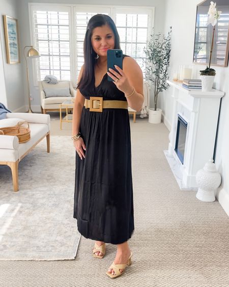 Black Waist-Defined Satin Maxi Dress. Is both stylish and versatile. Such an easy outfit to throw on and go. I added a raffia belt and new raffia heels.

Dress is true to size. I’m wearing a small. Sized up a half size in the shoes. 


Plunge V-neck.
Sleeveless arm openings.
Tie fastening in back.
Smocked waist.
Side split at flared maxi-length hem


#LTKFind #LTKstyletip #LTKunder50