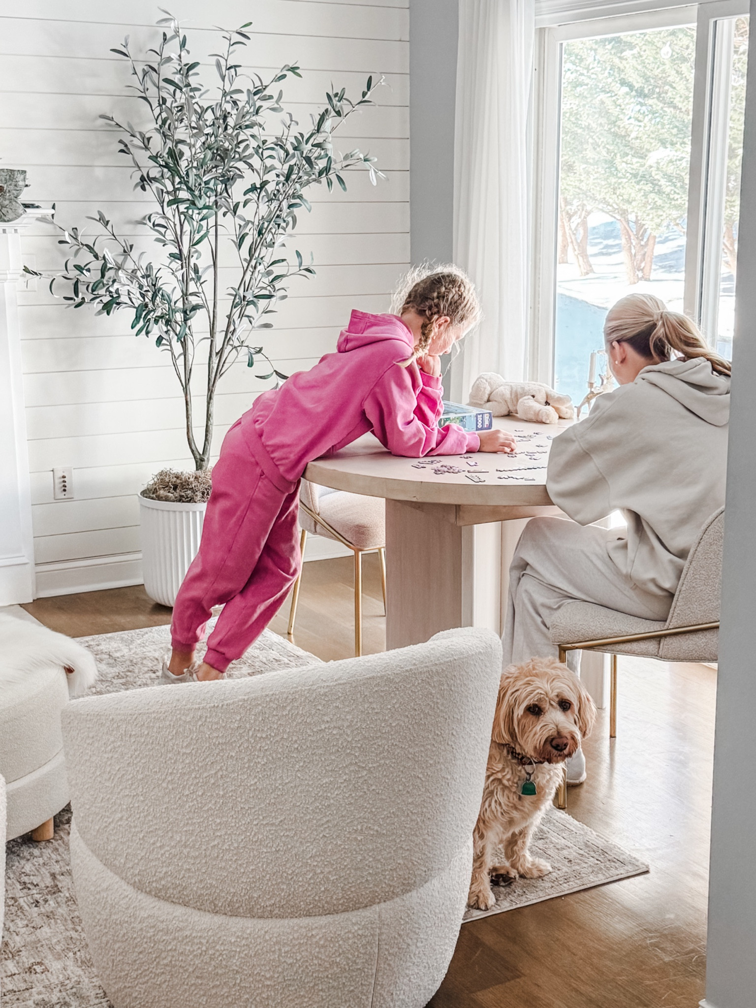 Artificial olive tree in ceramic pot
Studio McGee artificial tree
Living room decor
Better Homes & Gardens white resin plant pot
White fluted planter pot
Indoor outdoor planter
Artificial moss
Round dining table
Extendable dining table
Bouclé swivel chair
Neutral decor
Round table
Round ottoman
Living room
Dining room 
Pinch pleat curtain panels
Semi sheet curtain panels
Off white drapes


#LTKStyleTip #LTKHome #LTKFamily