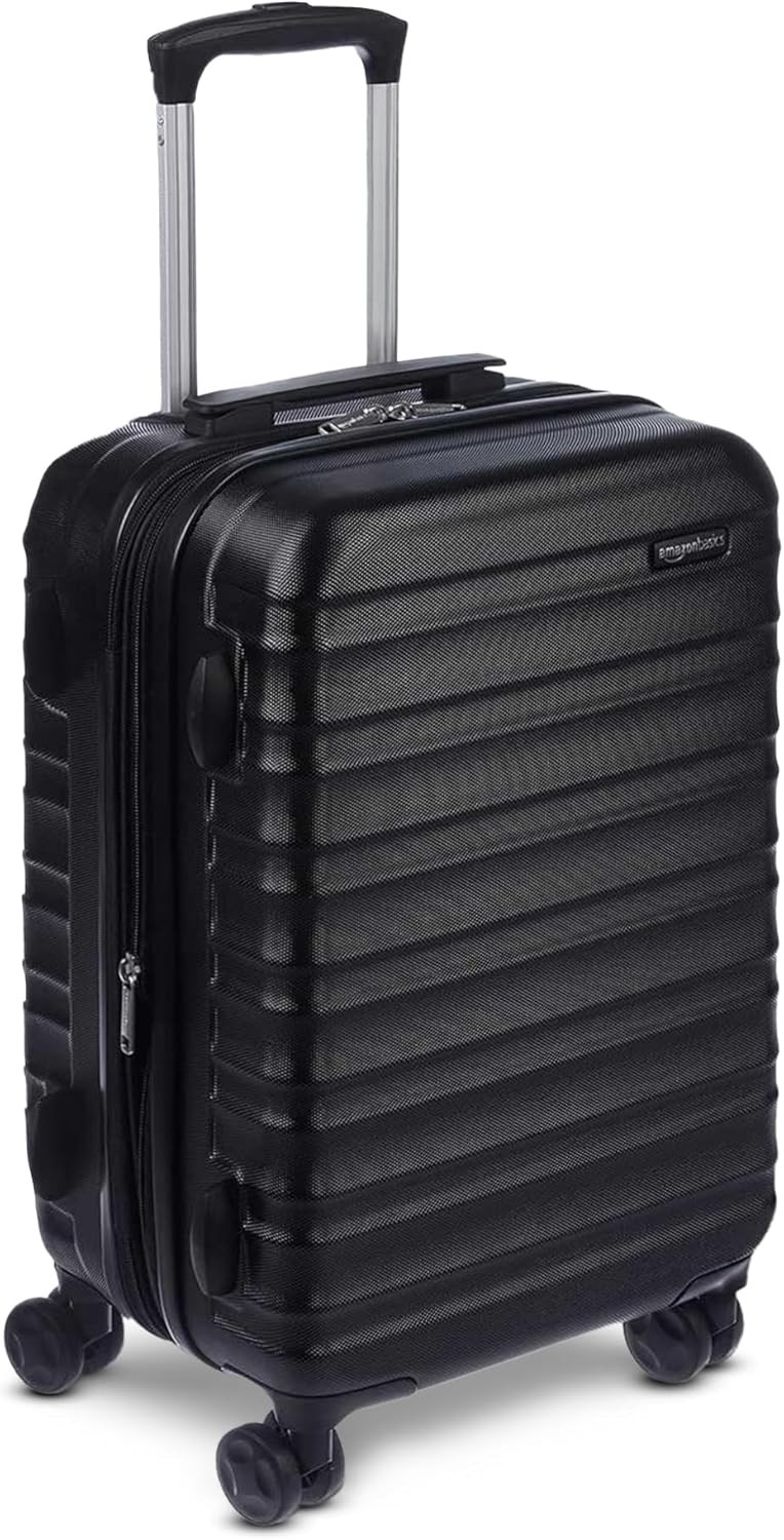 Amazon Basics 21" Hardside Carry-On Luggage with Spinner Wheels, Expandable for Up to 25% More Space, Scratch-Resistant Hard Shell, Telescoping Handle, Black | Amazon (US)