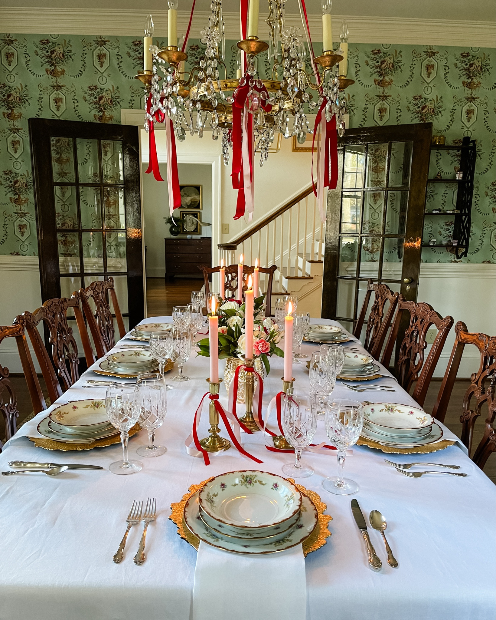 If a table could tell a love story, this would be it. ✨❤️ Stepping back in time to share last year’s Valentine’s table—where heirloom china, soft florals, and romantic details came together in the most magical way. I used my grandmother’s treasured Wemberly china by Harmony House, a collection filled with memories of family dinners at her table. The delicate pink and red ribbons draped from the chandelier, soft candlelight, and layered textures made this setting feel straight out of a dream. ❤️

But here’s the best part—this look isn’t just for Valentine’s Day! Picture it for Christmas, a winter bridal shower, or even an anniversary celebration. The charm and warmth of this tablescape make it perfect for any special occasion. ❤️

I’d love to hear your thoughts. Do you have a favorite heirloom piece that you love to use when entertaining? Let’s chat in the comments! And if you’re feeling inspired, save this post for later or send it to a friend who loves beautiful tables as much as we do. ❤️✨

#TablescapeInspo #RomanticDecor #HeirloomStyle #ValentinesTable #ElegantEntertaining

#LTKParties #LTKSeasonal #LTKHome