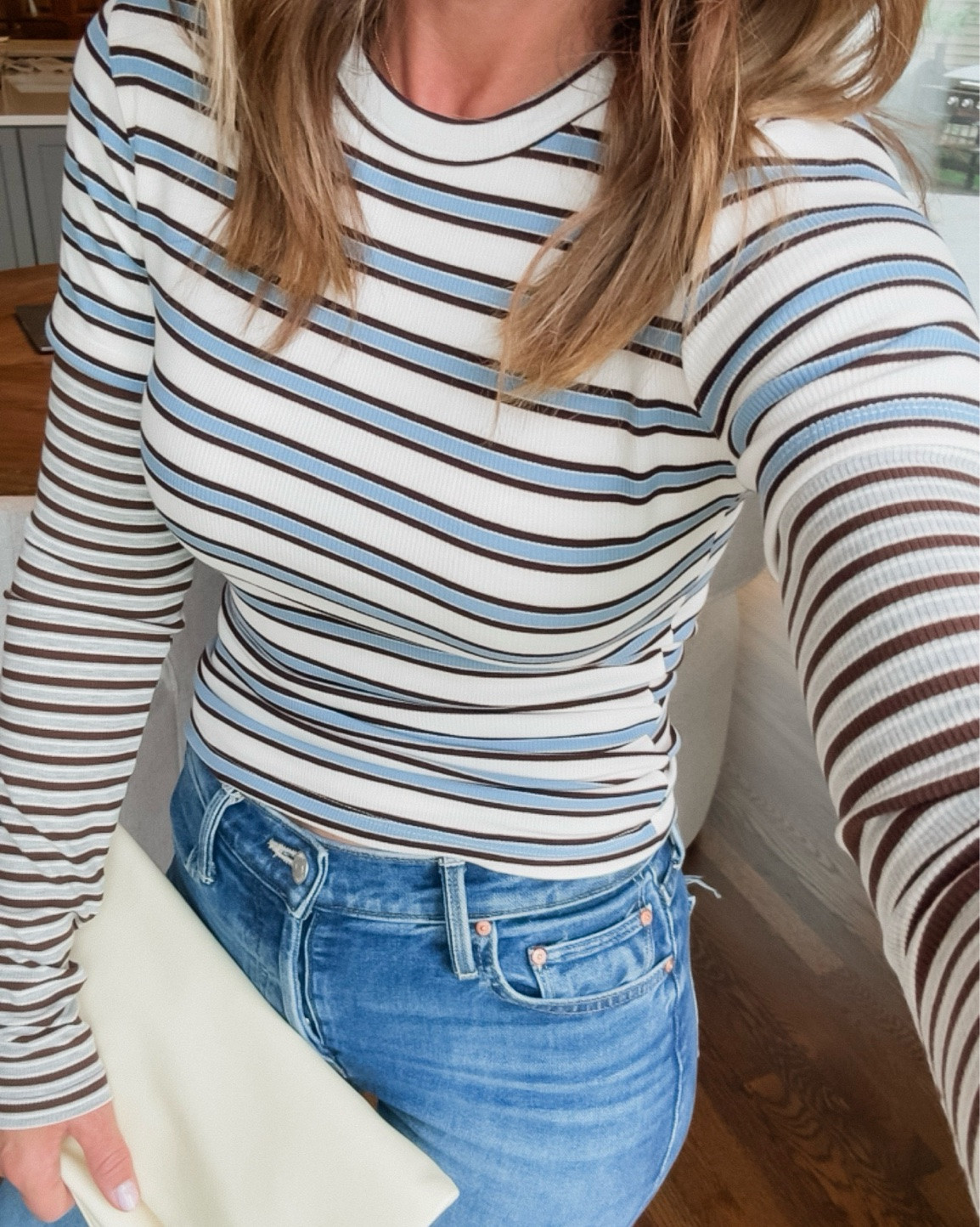 The cutest double layered tee. 
Long sleeve, ribbed. 3 color ways
XS here. Size up if you prefer a more loose fit.

#LTKSeasonal #LTKOver40