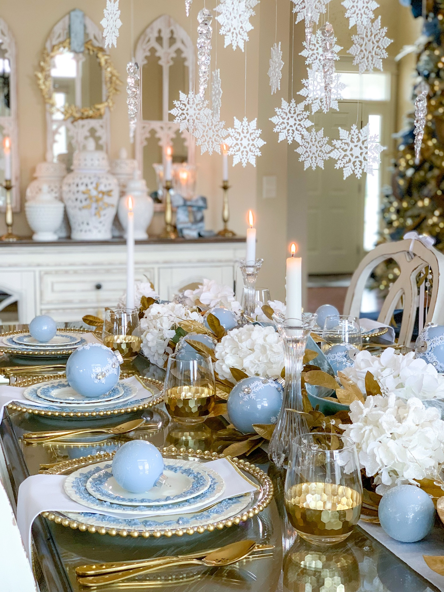 Shop my Snow and Ice Christmas Tablescape! 

Follow me on Instagram @thespilledsugar to see the tutorial for my DIY designer ornaments, seen here!

Christmas table, table styling, winter table, crystal candleholders, Wedgwood, Wedgwood blue, grand millennial, bay leaf, gold bay leaves, garland, icicle ornaments, diy ornaments, snowflake decor, gold chargers, flocked hydrangeas, white hydrangeas, gold wine glasses, stemless wine glass, dining room decor 

#LTKHoliday #LTKSeasonal #LTKhome
