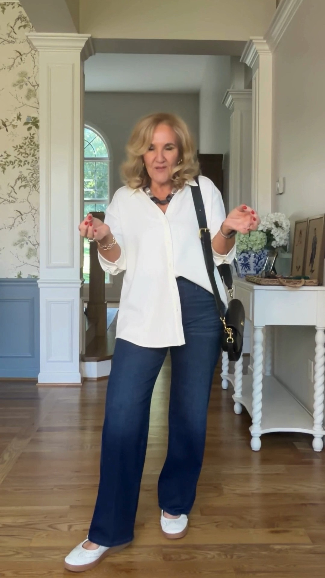 Tap the bell 🔔, heart ❤️ this post, and save for later!

This white button-front shirt and dark wide-leg jeans are the definition of easy polished style. The relaxed pieces feel comfortable and timeless, while white sneakers and a black crossbody keep the look practical for everyday wear.

Fit note: wearing a medium in the top, Jeans in a size 1 short

#LTKootd #LTKWorkwear #LTKOver40