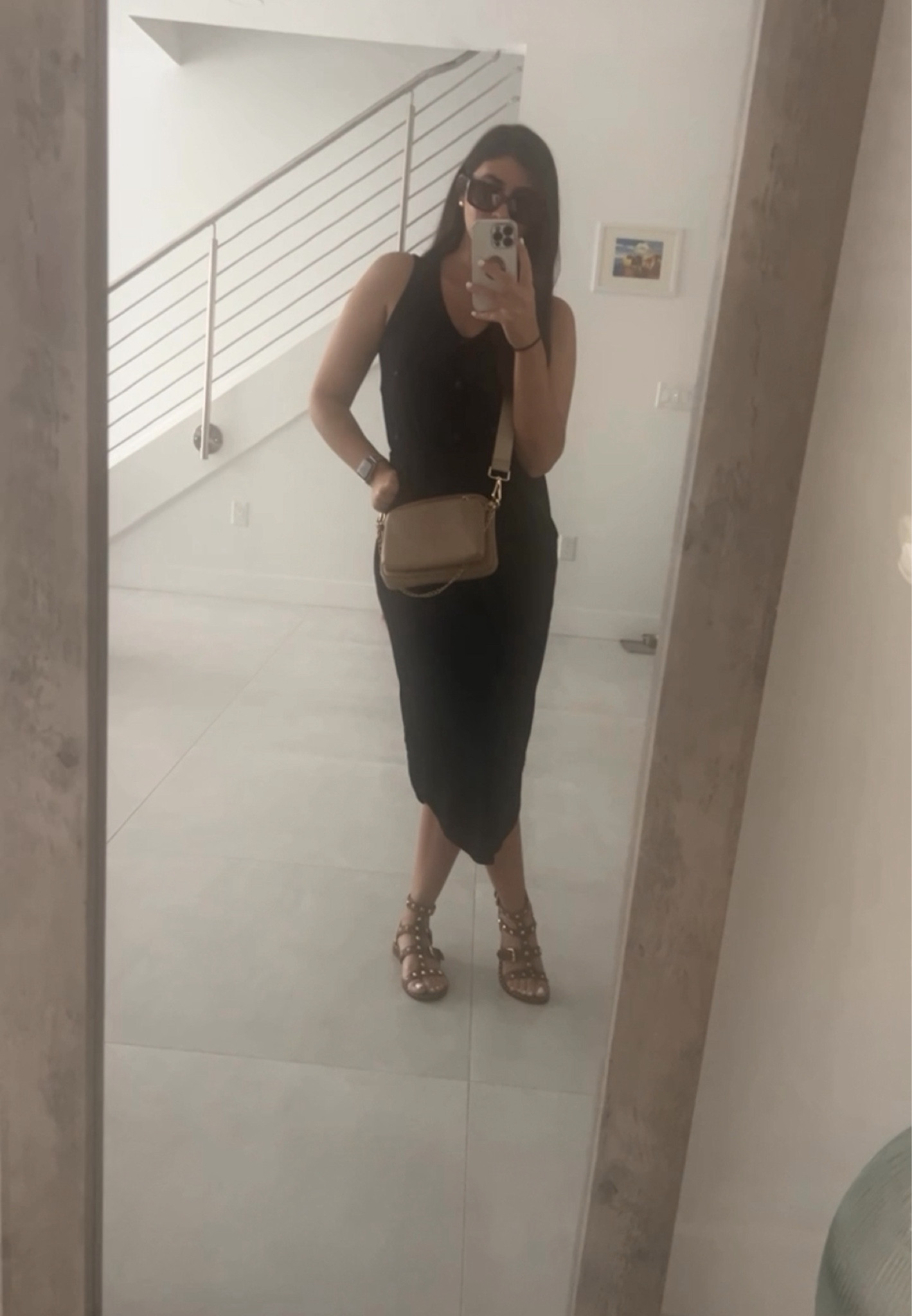 Effortlessly chic in this sleek black dress paired with statement sandals and a versatile crossbody bag. Perfect for a day out or a casual evening look. Shop the full outfit on my Like to Know It! #OOTD #FashionInspo #SummerStyle #EffortlessChic #CasualElegance #ShopMyLook #LikeToKnowIt #LTKfashion #DressUpYourDay #StyleWithConfidence

#LTKStyleTip #LTKFindsUnder50 #LTKSeasonal