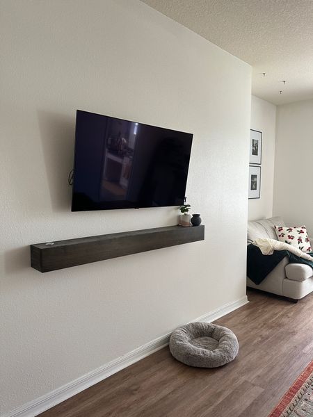 I love this modern floating TV mantel so much! It's currently on sale, too.

#LTKsalealert #LTKhome