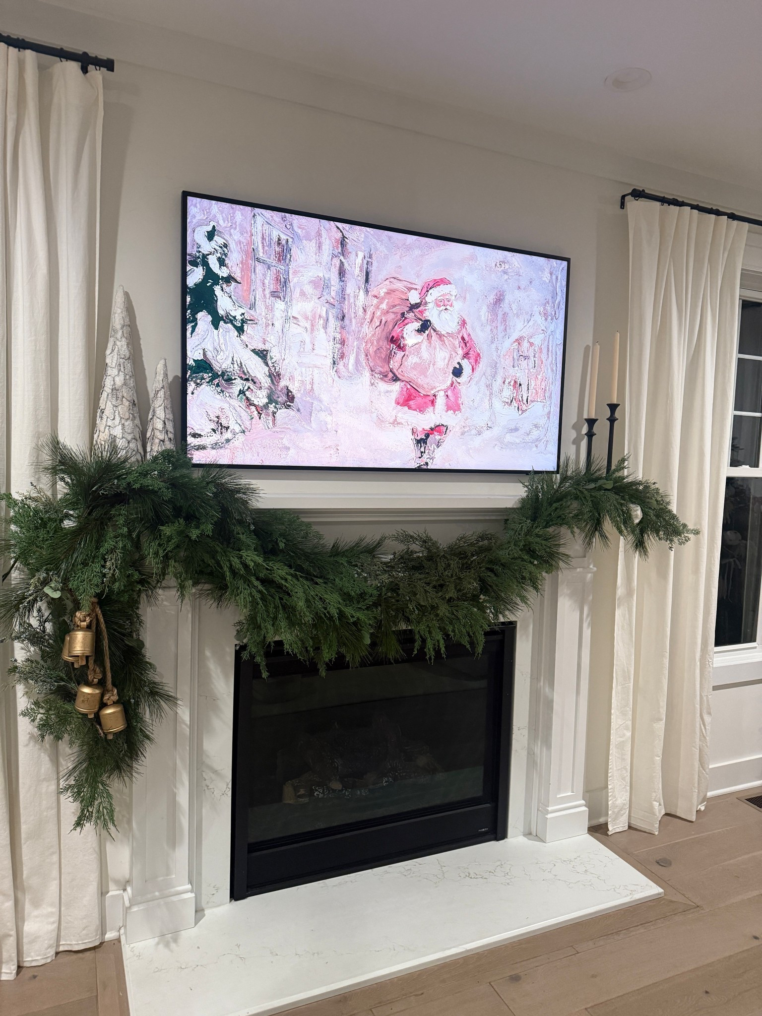 love this frame tv art i found, it’s on major sale! linking my mantle details but the key is to layer lots of garland! 

#LTKHoliday #LTKCyberWeek #LTKGiftGuide