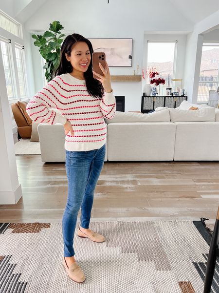 Valentines Day outfit with a more casual feel. My sweater is on sale and wearing size XS. Pairing with Abercrombie maternity jeans on sale for 25% off. Wearing size 24 and would recommend short sizing. Would be a great teacher outfit or smart casual workwear  

#LTKbump #LTKsalealert #LTKshoecrush
