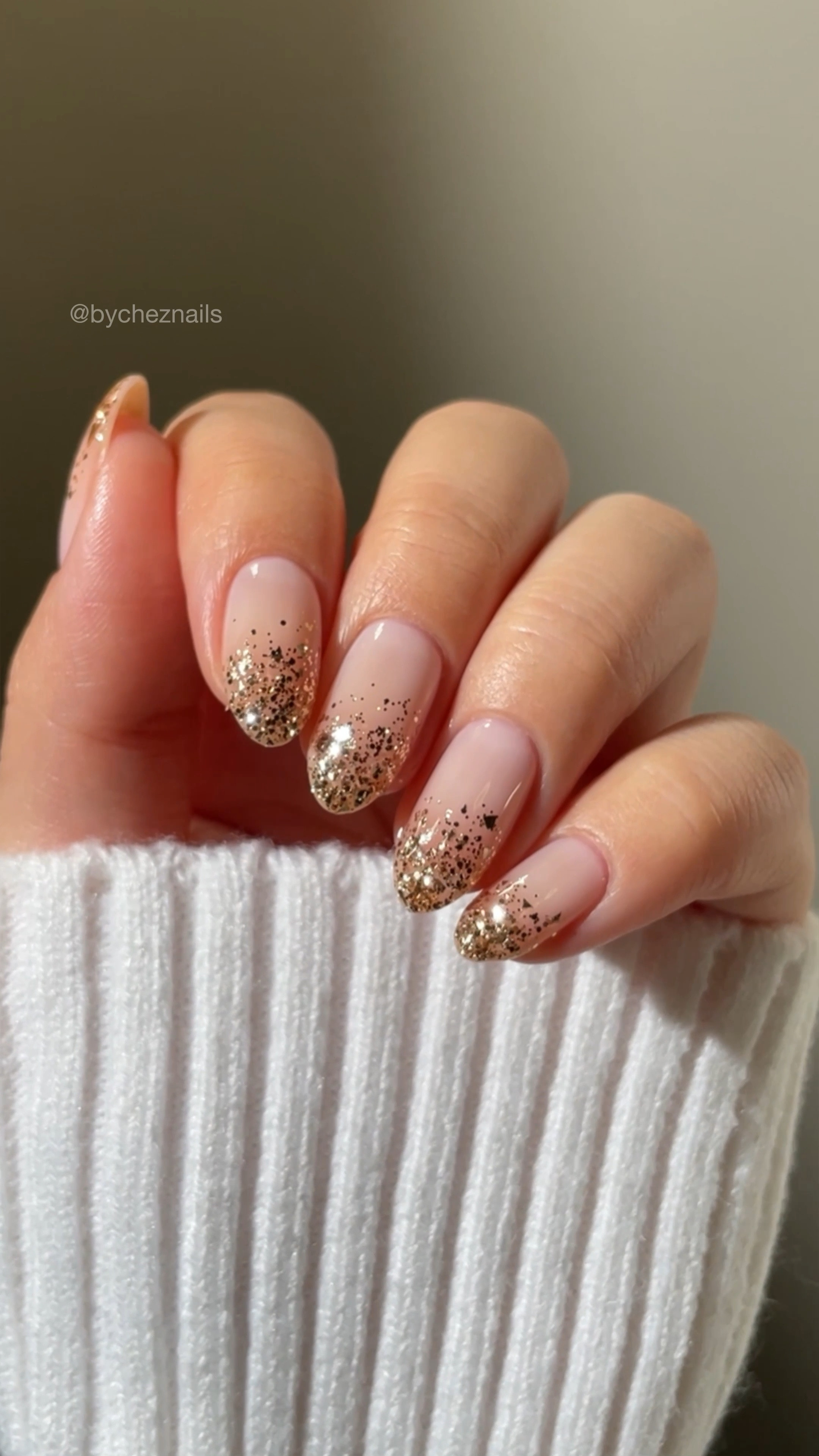 So easy and elegant ✨ a gold glitter gradient is always so chic and quick to create! gold nails, glitter nails, natural almond nails, diy nail tutorial 

#LTKparties #LTKbeauty