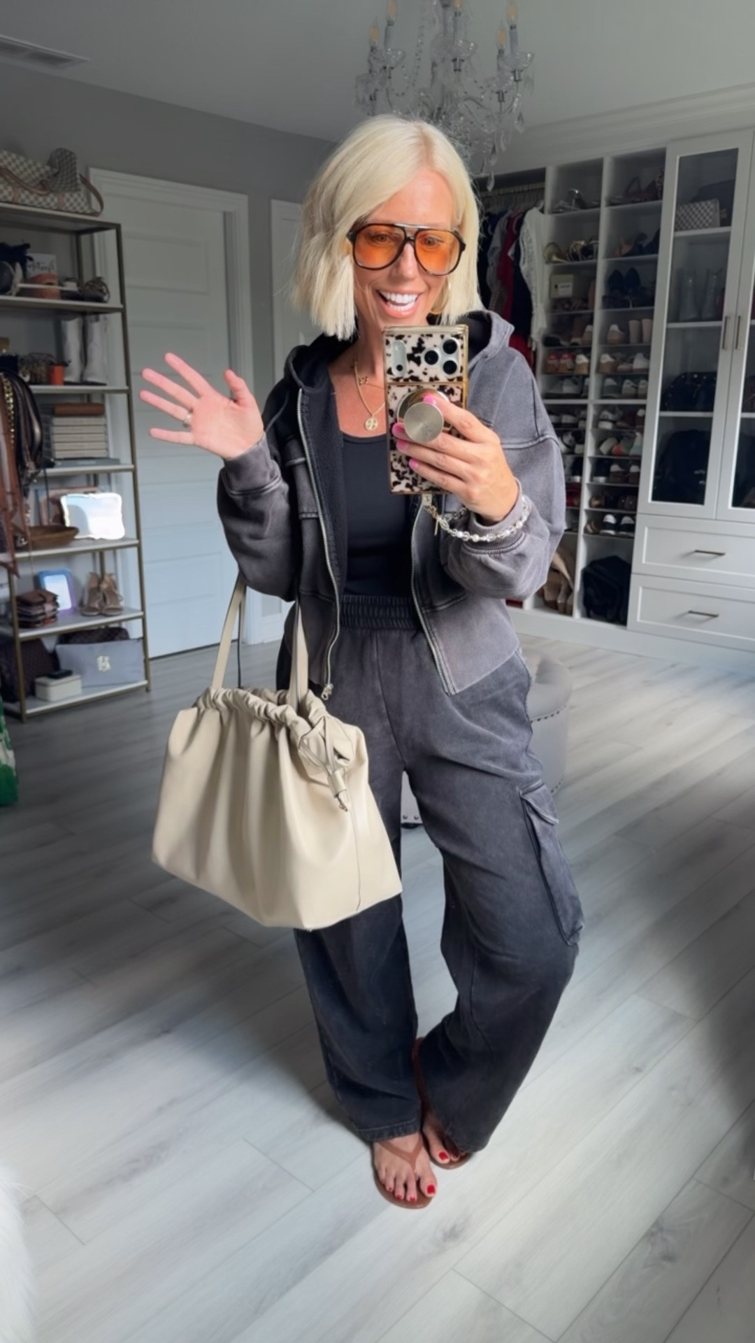 Tank medium
Hoodie and pants small
Flip flops run a bit small

#LTKSaleAlert #LTKootd #LTKmomlife