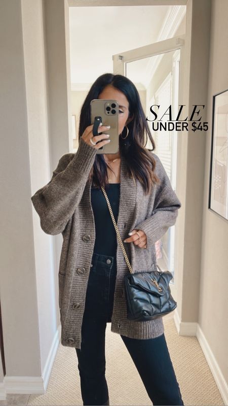 My cardigan is currently on sale and under $45! Wearing the size XS runs materially oversized, StylinByAylin 

#LTKSeasonal #LTKunder100 #LTKstyletip