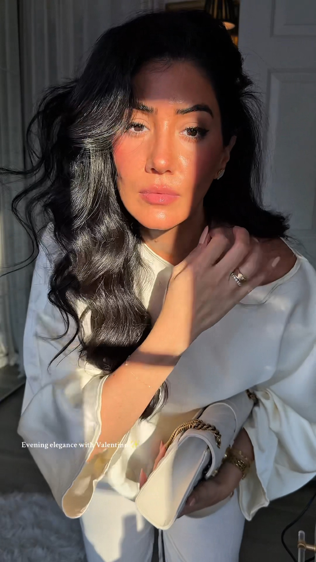 Evening glam with Valentino ✨ I always pack a few go-to beauty essentials before heading out—Born in Roma for a lasting, feminine scent, a plumping gloss to refresh lips, and a hydrating balm for that midnight touch-up 💄🌙 Linking my evening edit for beauty on the go. #ValentinoBeauty #LTKBeauty 