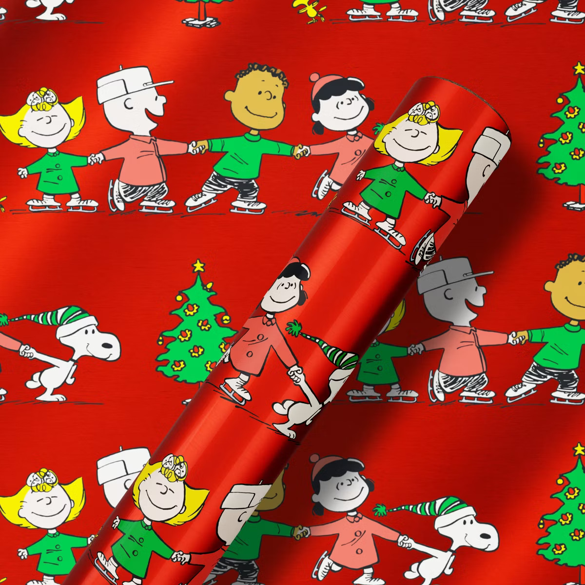 American Greetings 30" 25 sq ft Metallized Peanuts Ice Skating on Red Gift Wrap | Target