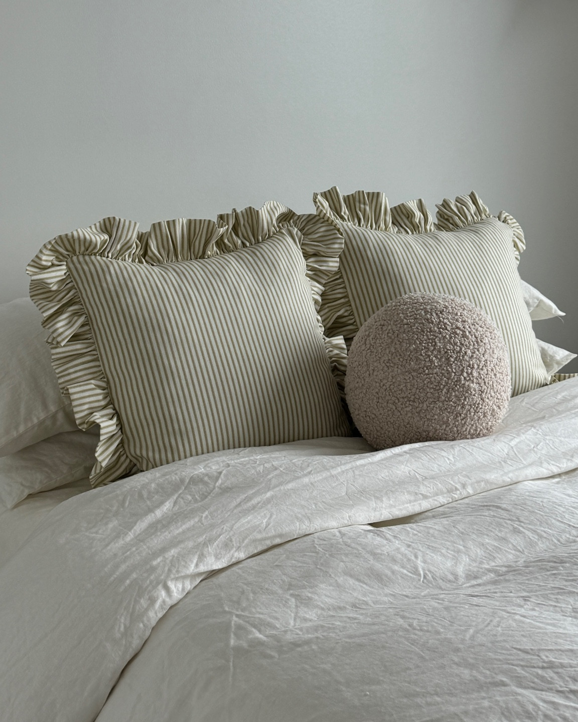 green stripe ruffled pillows! ☁️

10% off new customers with my code INFG-BYMONICACASTRO10 🫶🏽

#LTKHome