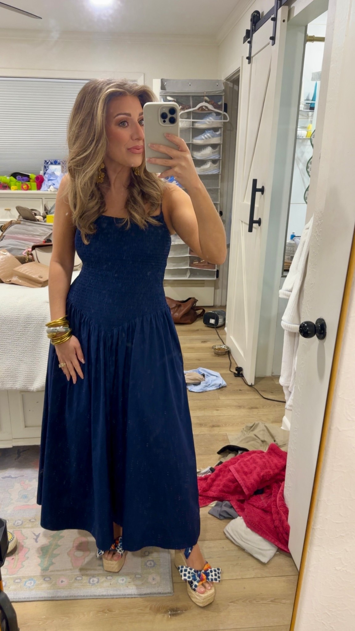 I am loving this #LucyParis dress that can easily be dressed up with heels / wedges OR dressed down paired with sneakers 🫶🏻 And… it’s on sale! Comes in three different colors. I’m wearing the small. 

Dropped waist, drop waist, drop waist dress, dropped waist dress, maxi, navy, navy maxi, navy dress, smocked, spring dress, summer dress, wedding guest dress, baby shower dress, sun dress, church dress