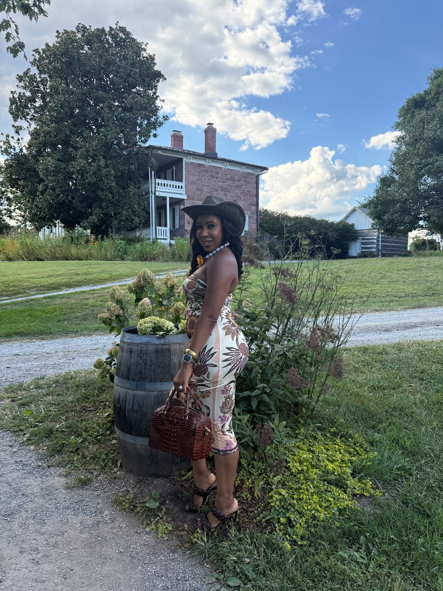 Country charm meets fall fashion 🍁
I shopped my closet for this floral midi and styled it with a cowgirl hat, woven bag, and strappy heels for a fun winery afternoon. The warm tones make it perfect for September outings, and it layers beautifully with a denim jacket when the temps dip. Linked a few floral and earthy-tone alternatives so you can capture the vibe. 🌻🤎

#FallFashion #CountryChic #WineryStyle 

#LTKStyleTip #LTKFallSale #LTKSaleAlert