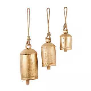 Litton Lane Gold Metal Tibetan Inspired Cylindrical Decorative Cow Bells with Jute Hanging Rope (... | The Home Depot