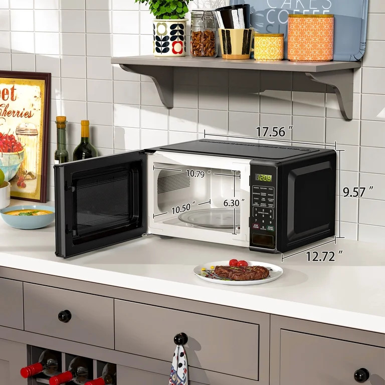 Mainstays 0.7 Cu ft Countertop Microwave Oven, 700 Watts, Black, New | Walmart (US)