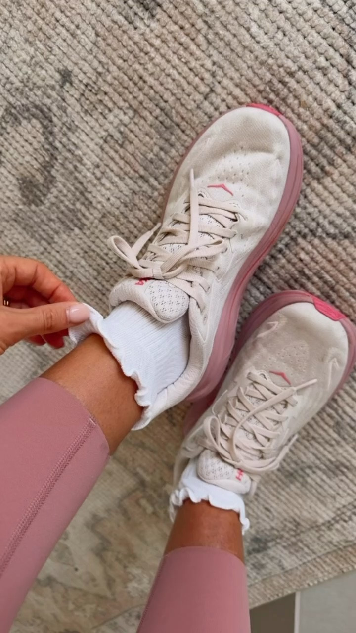 These are the cutest athletic sneaker while staying comfy! I can’t get enough of these - they’ve been on repeat for me. Love pairing with ruffle socks for an elevated touch 

Loverly grey, cute sneakers for women, hoka sneaker, pink and white athletic sneaker 

#LTKActive