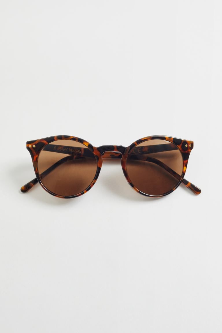 Klassische Sonnenbrille mit rundem Rahmen | H&M (DE, AT, CH, NL, FI)