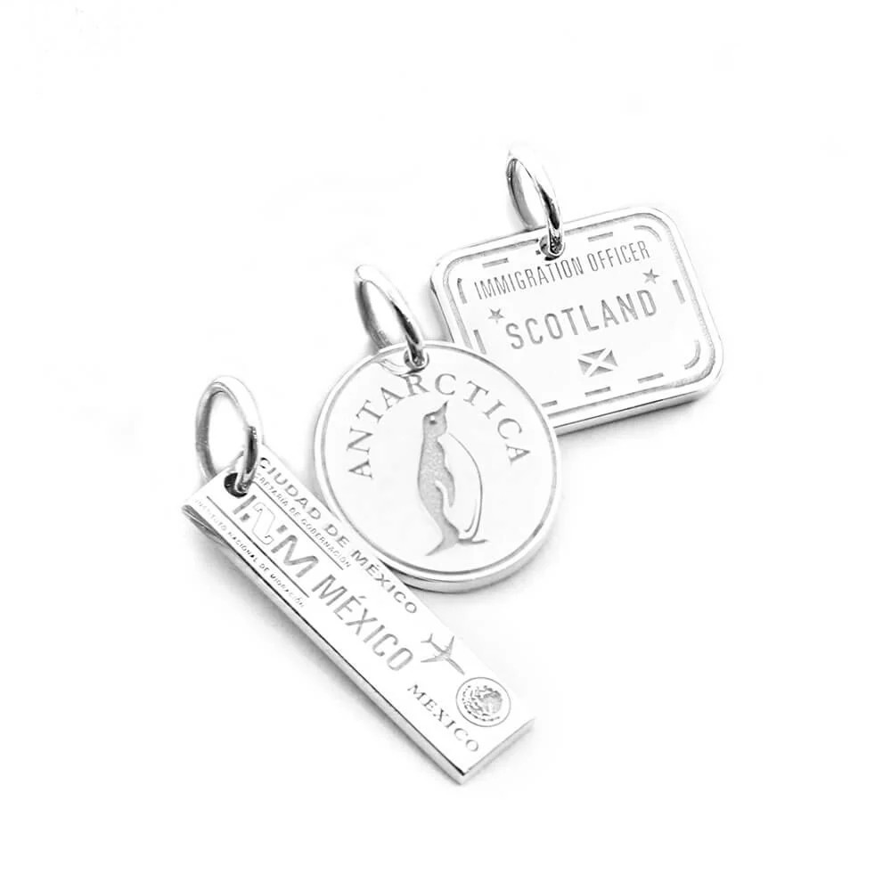 Passport Stamp Charm, Silver | Jet Set Candy (US)