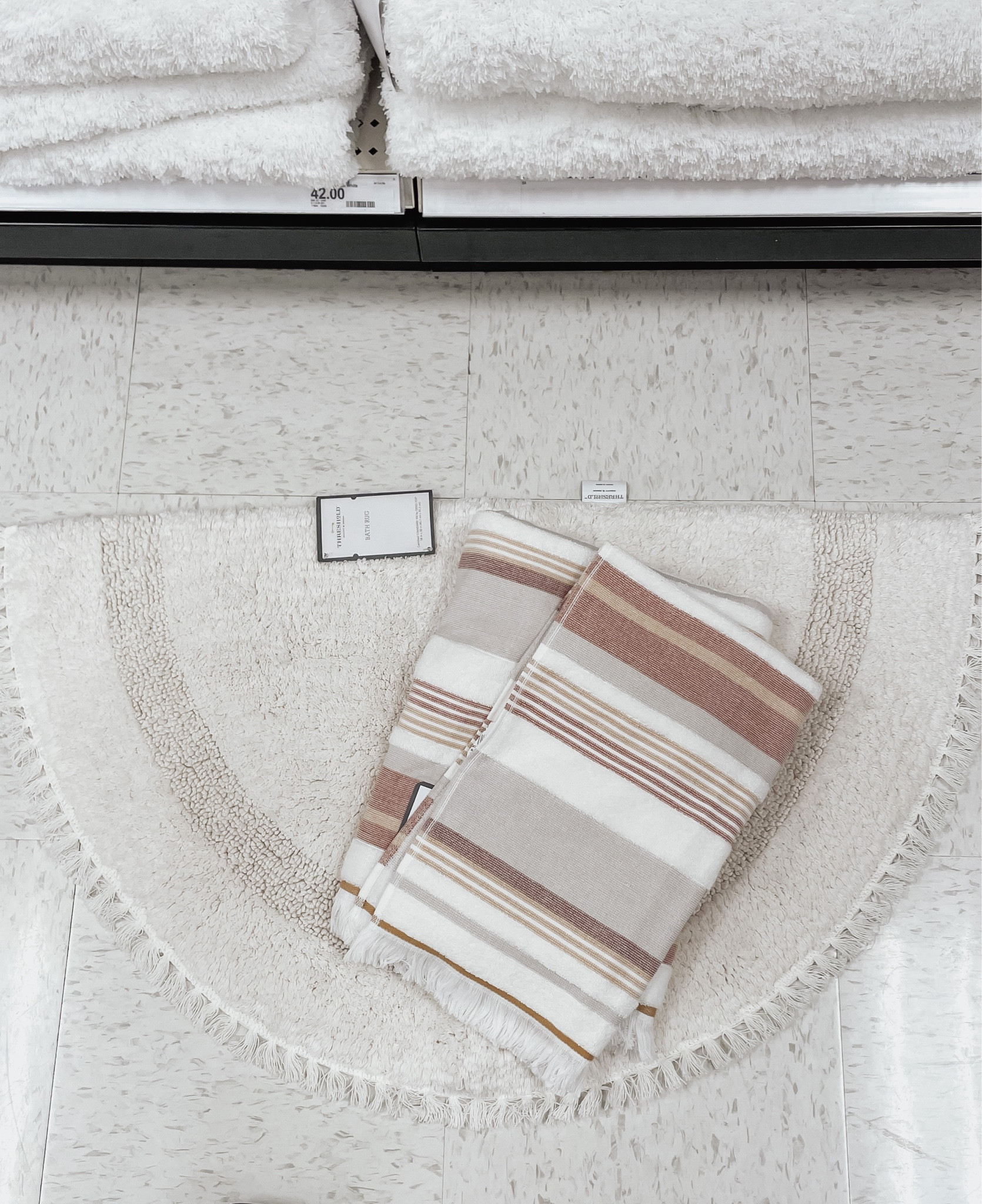 Peachy neutral palette for our guest bathroom ✨ I love this half moon bath mat for a half bath! It fits perfectly in them! 

#LTKFind #LTKhome #LTKunder100