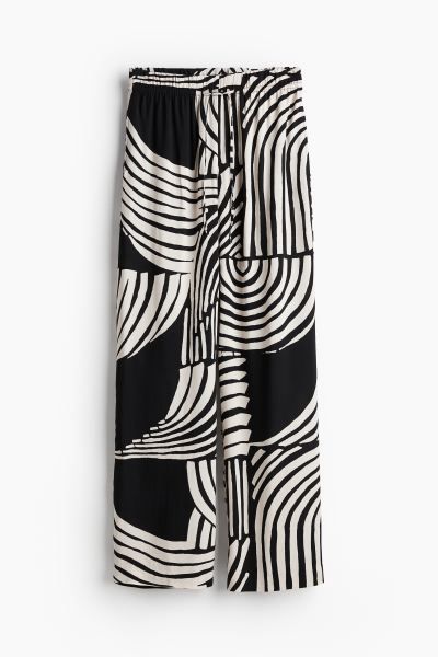 Wide pull-on trousers - Black/Patterned - Ladies | H&M GB | H&M (UK, MY, IN, SG, PH, TW, HK)
