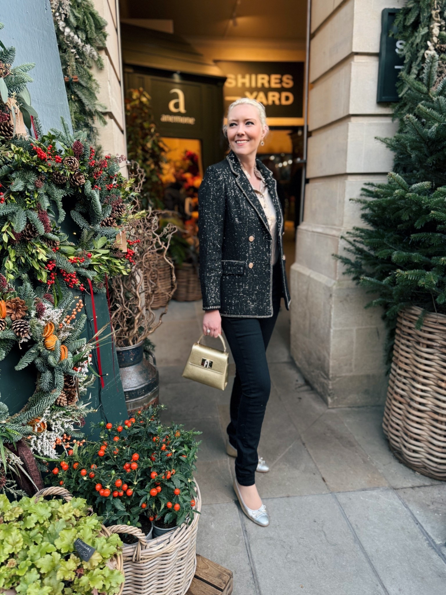 Tis the season to sparkle day or night! ✨ However, there is a way to wear sequins during the day!...I love this black sequin double breasted blazer and like to draw attention to the gold buttons by wearing a gold handbag and gold ballerina flats + my new black and gold Jon Richard earrings!

Black Gold Button Double Breasted Sequin Jacket - Monsoon (past) 
Gold leather 1927 limited edition handbag - Furla (past)
Gold blouse - Boden (last winter)
Kara Gold Ballerinas - LK Bennett
Jet Clover Earrings - Jon Richard 
Black Skinny Jeans - Calvin Klein

#LTKwinter #LTKeurope #LTKfestive