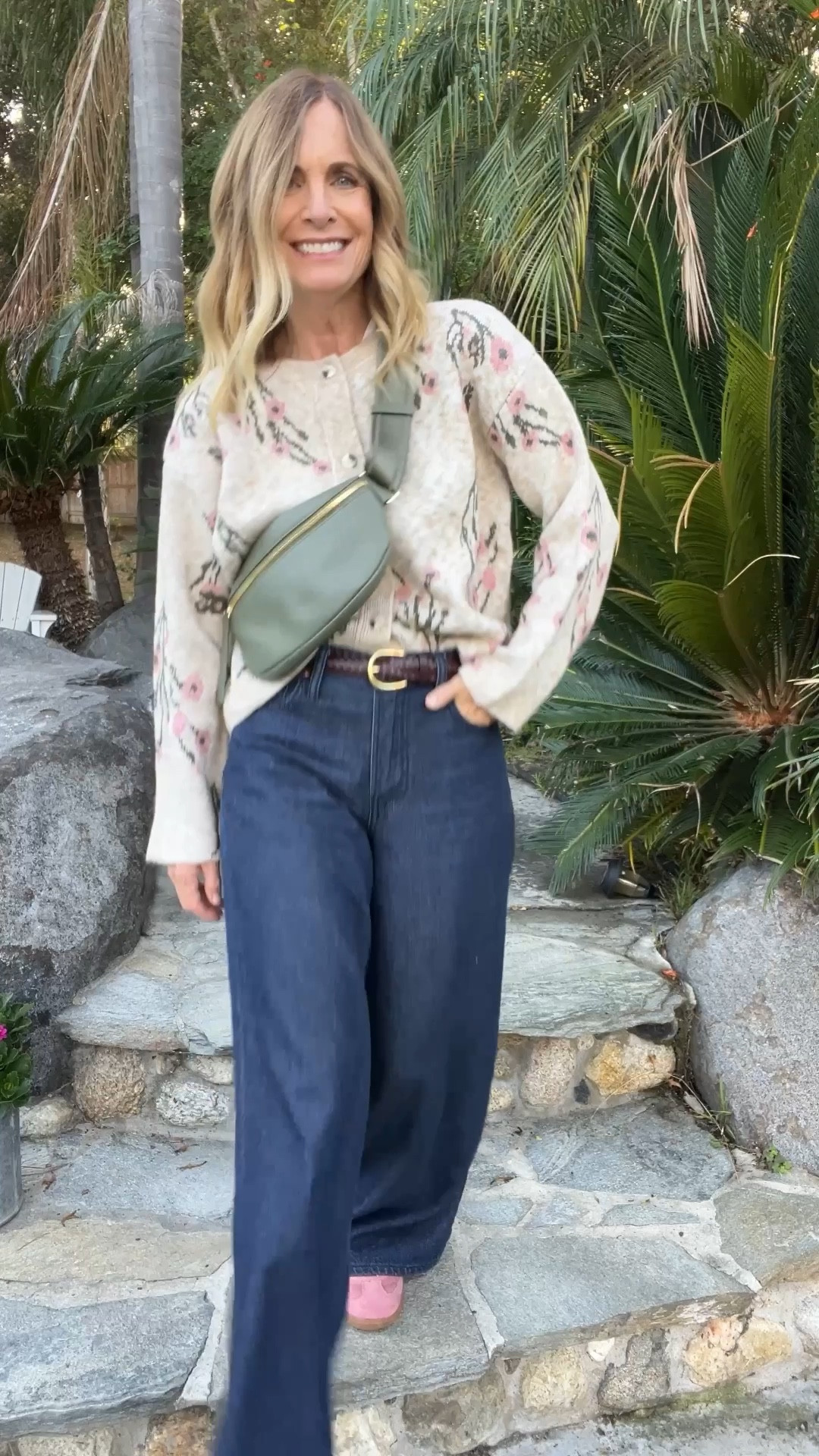 The perfect Fall outfit! This sweater is so darn cute! And love the sage green crossbody purse! 
Wide leg jeans on repeat with my pick suede sneakers! 

I’m 5’4” wearing XS sweater and tee. 25 jeans.

#LTKgrwm #LTKOver40 #LTKHoliday