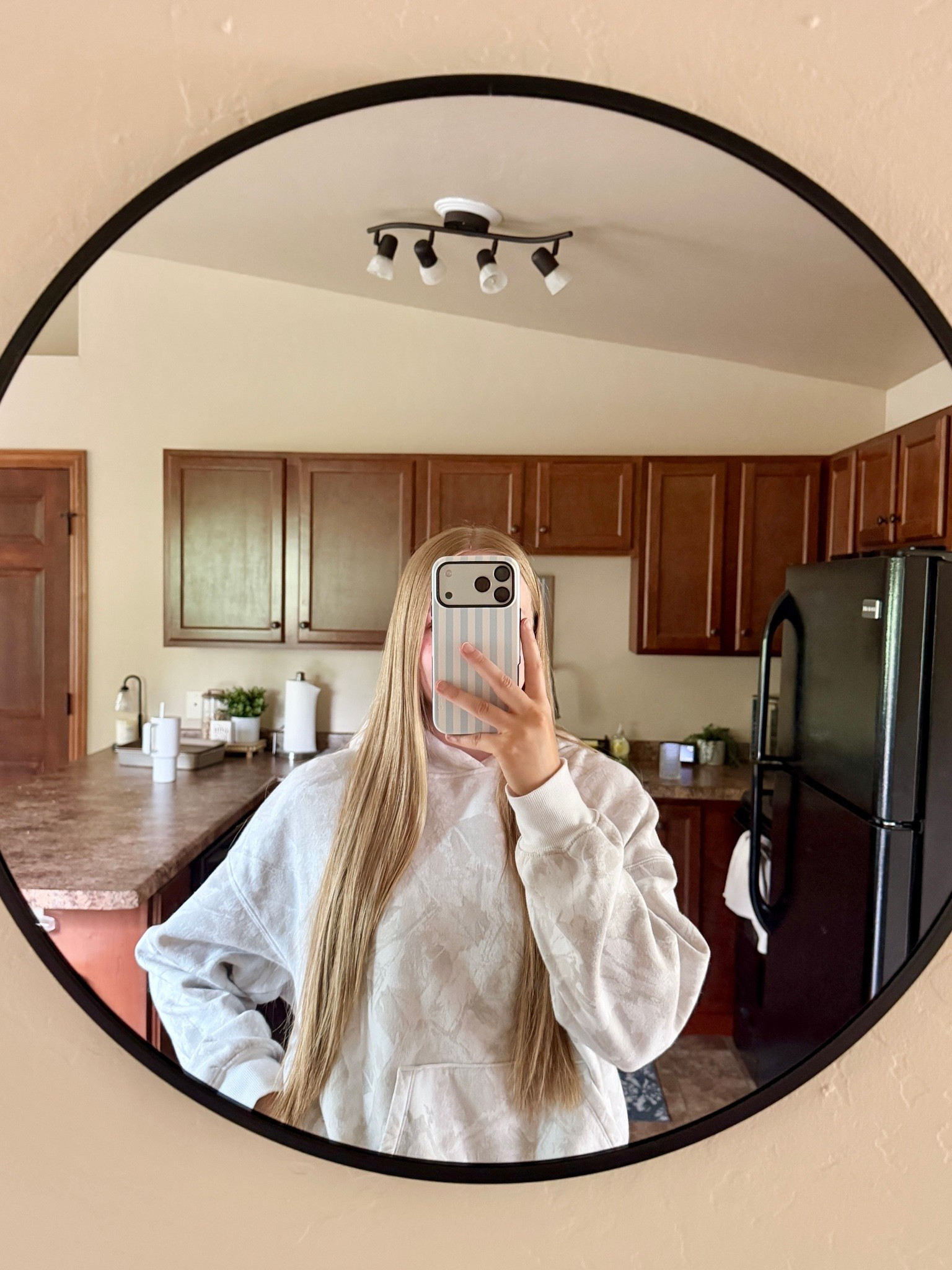 Outfit of the Day - iPhone 17 Pro Max Case from Casely and Oversized Camo Sweatshirt

#LTKootd