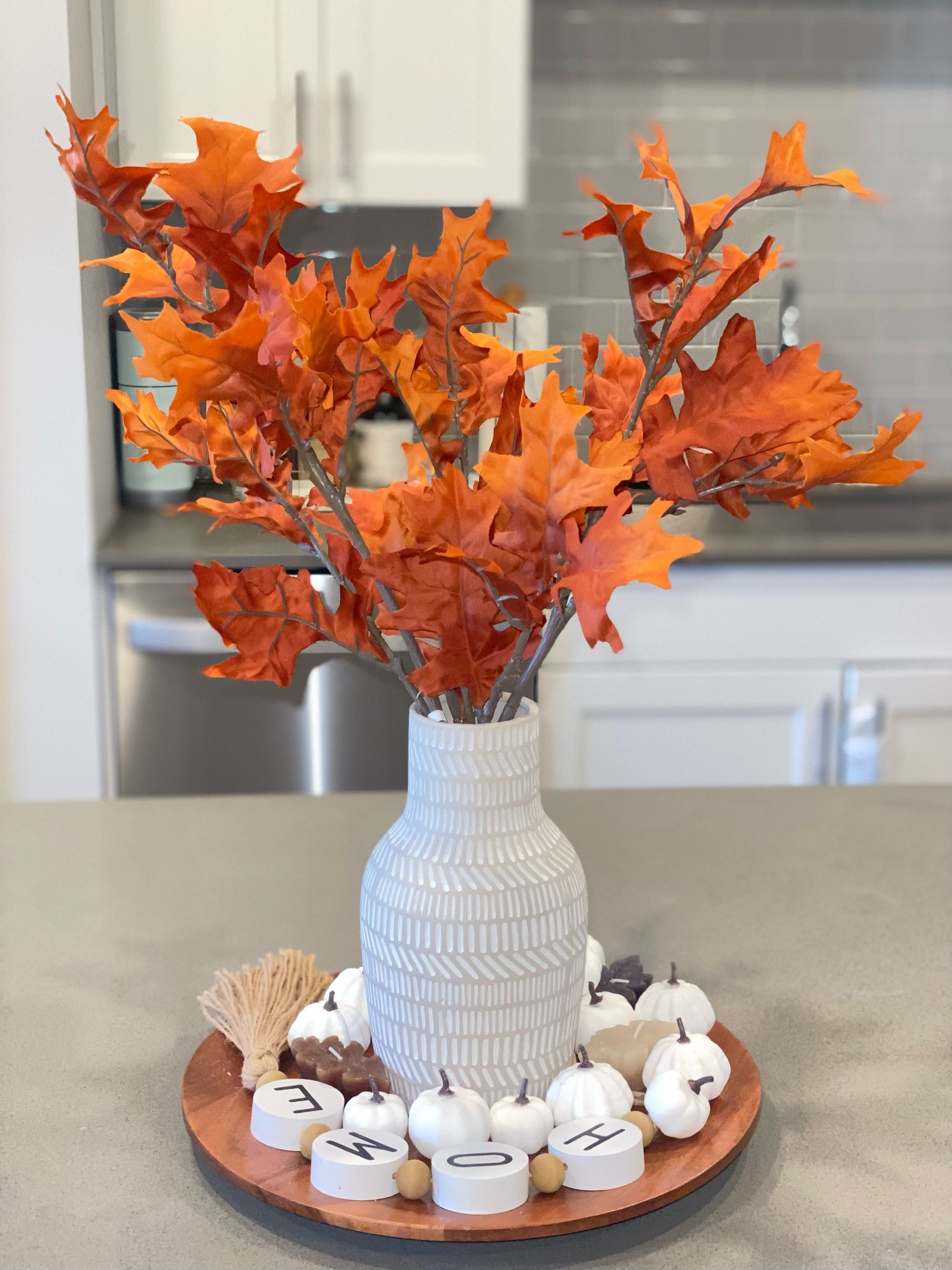 Target Fall Decor 🎯
•Oak Leaf Stem by Threshold
•Mini pumpkin fillers
•Acacia wood platter

This plate charger is from Hearth and Hand with Magnolia. It’s actually sold out but they have a very similar one.

My vase and leaves candles are from Michael's and the “home” tassel is from Hobby Lobby. They’ve been in my collection for a while. I linked different ones that are just as pretty!

#LTKHalloween #LTKSeasonal #LTKhome