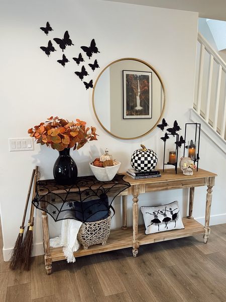 Had to spookify the entryway console table with some Halloween Decor 🎃 Links from Afloral, World Market, Mackenzie Childs, and more!! 

#LTKhome #LTKHalloween #LTKSeasonal